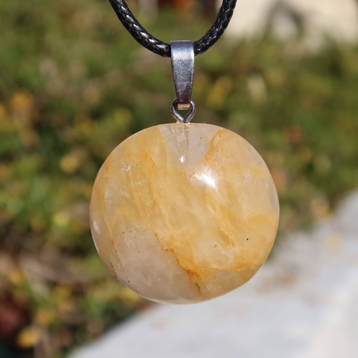 Limonit Quarz Golden Healer Anhänger - Lebensfreude - Nr. 15 with clear quartz and golden-brown inclusions on a black cord.