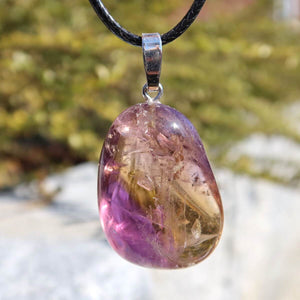 Ametrin pendant with silver bail, featuring unique violet and gold hues, showcasing natural color blend, 34mm UNIKAT No. 5.