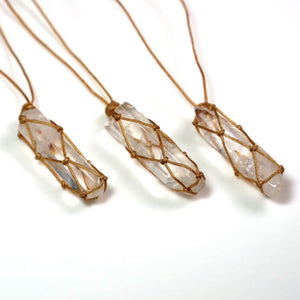 Handcrafted Bergkristall macrame necklaces with unique, adjustable brown cords showcasing natural crystals.