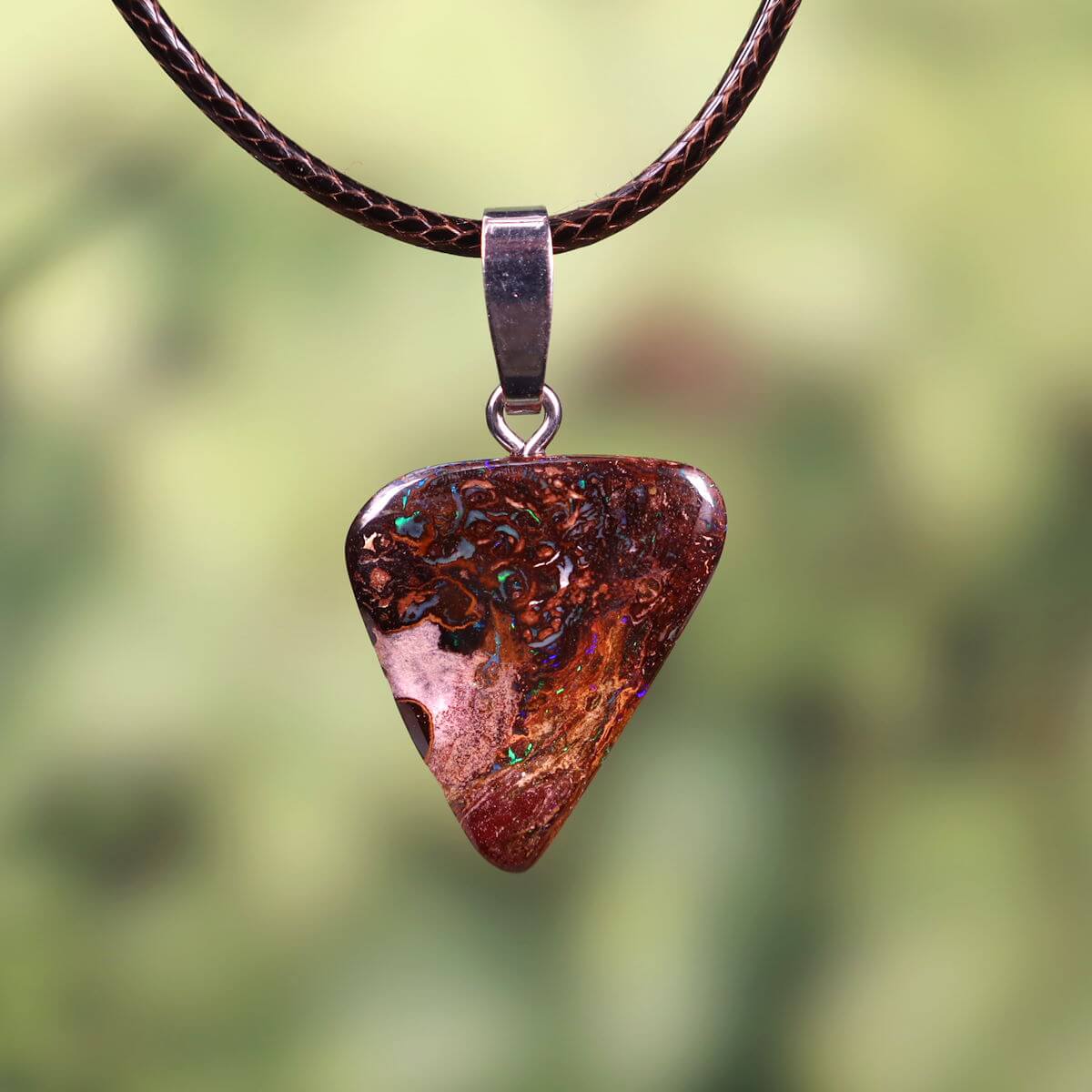 Boulder Opal pendant with massive silver loop, handcrafted and polished, unique gemstone from Australia, size 24x20mm.