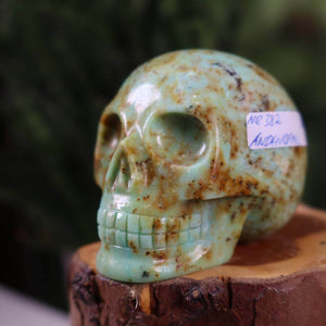 Handcrafted Andean Opal Crystal Skull, unique gemstone carving, 6x6 cm size, shown on display, Nr. 382.