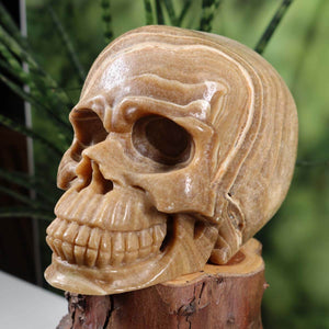 Handcrafted Aragonite crystal skull, unique collector's item available at Steinwelten Graz and Wiener Neustadt.