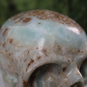 Handcrafted blue aragonite calcite crystal skull collectible with unique shape; available at Steinwelten, minerals and gemstones online.