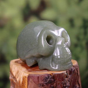 Handcrafted Aventurine green crystal skull, unique collector's piece, on display - Mineralien und Edelsteine Steinwelten.