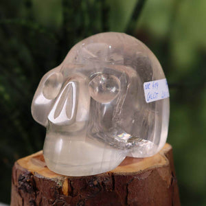 Handcrafted white calcite crystal skull, unique collector's item, 7x7 cm, on display, product number 414.