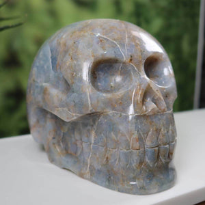 Handcrafted blue calcite crystal skull, mineral and gemstone collectible available at Steinwelten online.