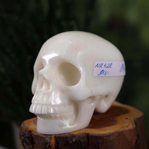 Handcrafted natural stone crystal skull, approx. 7x6 cm, unique design with precise detailing, product number 428.