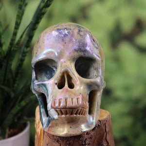 Handcrafted crystal skull from natural stone with unique patterns, collector's item - 12x9 cm