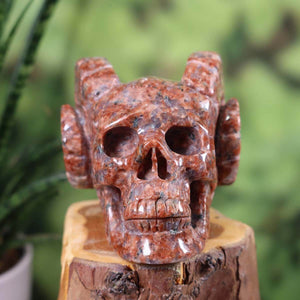 Handcrafted granite crystal skull with unique shape, collector's item, Steinwelten collection - Kristall Schädel online kaufen.