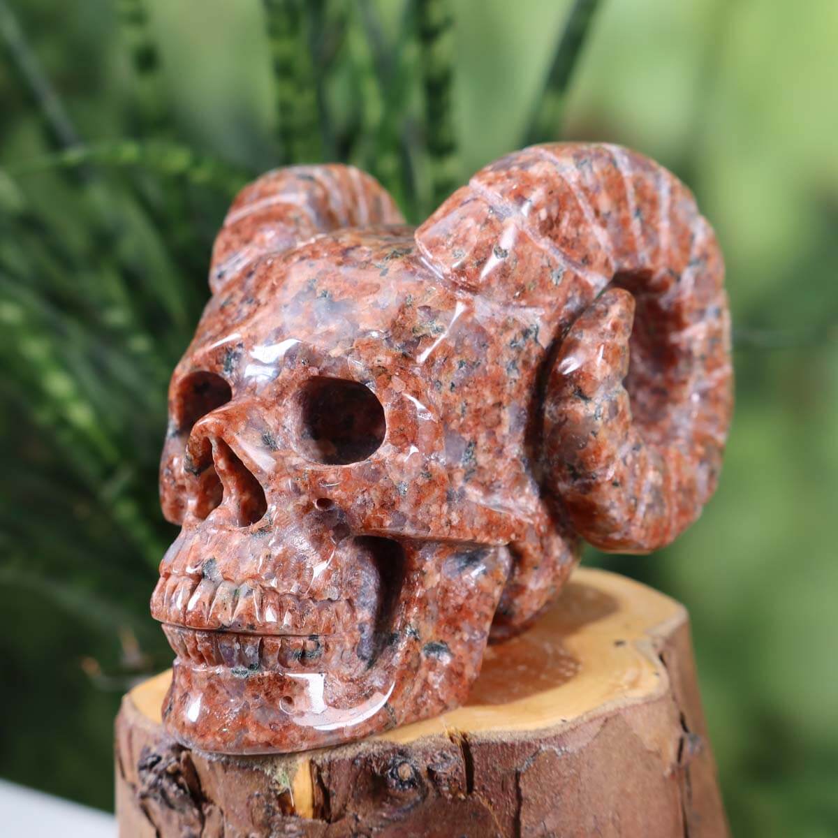 Handcrafted granite crystal skull with unique shape and horns, collector's item from Steinwelten.
