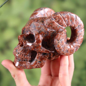 Handcrafted granite crystal skull with unique shape and intricate details, Steinwelten, Kristall Schädel online kaufen, collectible piece.