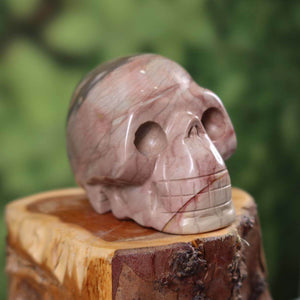 Handcrafted Jasper Crystal Skull Collectible with Unique Shape, 7x5 cm, on Wooden Base
