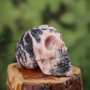 Handcrafted marble crystal skull, unique design, 7x5 cm – natural stone craftsmanship on wood display, product number 407.