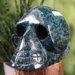 Handcrafted moss agate crystal skull collector's item, 13x10 cm, unique mineral gemstone available online at Steinwelten.