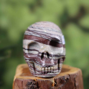 Handcrafted Printstone crystal skull sculpture on display - 7x6 cm