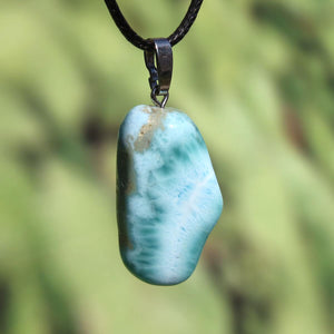 Unique Larimar pendant with silver loop, 35mm, featuring natural Dominican gemstone for enhanced perception and protection.