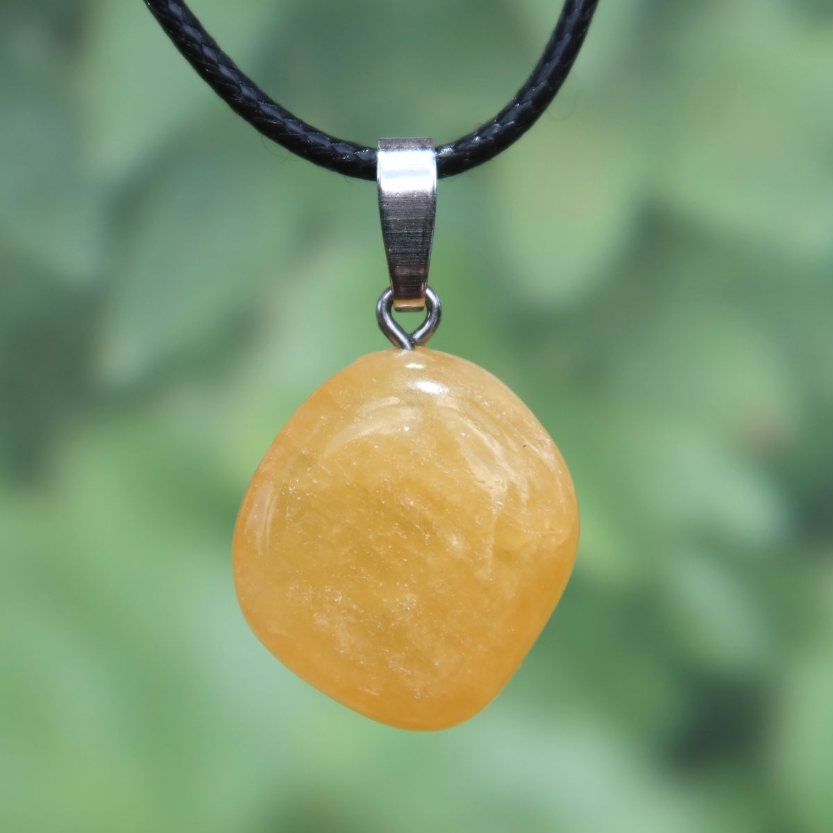Calcit orange Anhänger - Selbstvertrauen und Positivität - Nr. 5, strahlend und warmes Design aus natürlichem Calcit.
