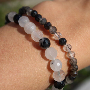 Faceted tourmaline quartz gemstone bracelets in 4-6-8mm variants; elegant design combining protective and clear quartz properties.
