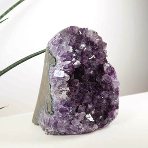 Uruguay Amethyst Mini Geode 11x15cm with dark violet crystals, symbolizing harmony and relaxation.