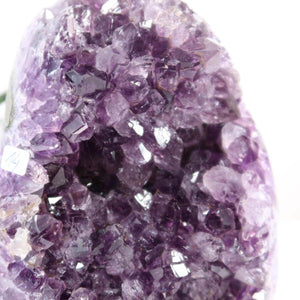 Uruguay Amethyst Mini Geode close-up displaying dark purple crystals for harmony and relaxation, 11x15cm, high quality.