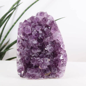Uruguay Amethyst Mini Geode with deep purple crystals, 10x13cm, known for harmony and relaxation qualities.