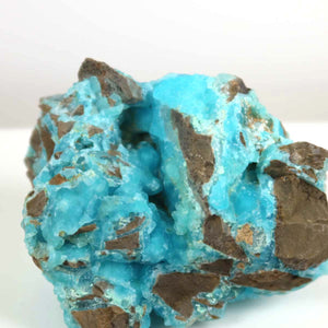 Hemimorphite raw stone with vibrant turquoise blue color, 9x8x5 cm, unique collector's mineral, no polish, natural crystal structure.