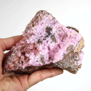 Kobalt Calcit raw mineral stone 10x7x4 cm, vibrant pink crystal from Morocco, showcasing natural cobalt influence and unique structure.