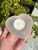 Selenite tealight holder in heart shape, 9cm, known as light bringer and protection stone, used for stress relief and stability enhancement.